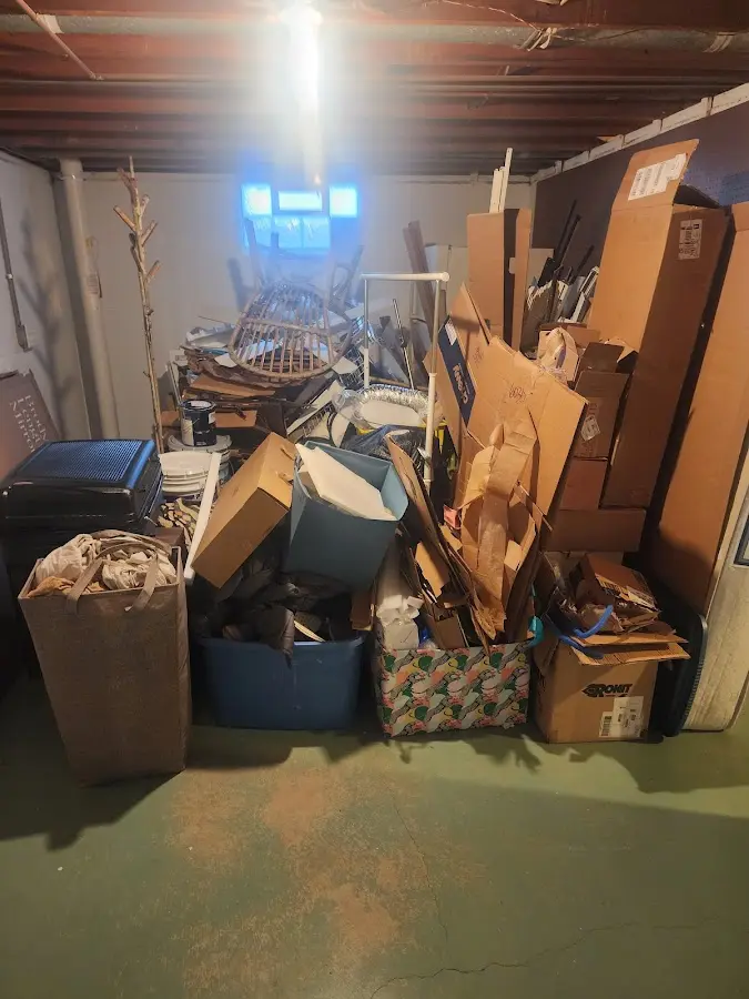 Roll-off dumpster container at job site for 2 Yard Dumpster Rental in Palmer